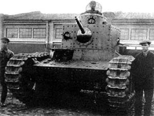 A T-12 outside a factory