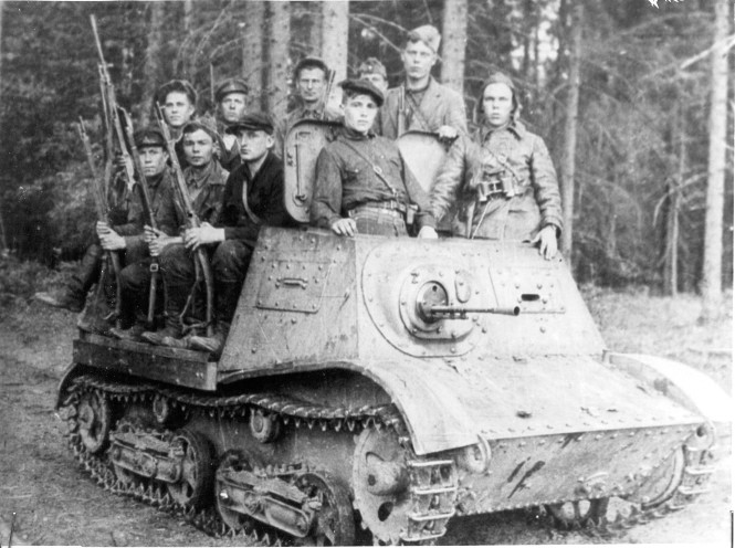 A group of partisans use a Komsomolets as an APC