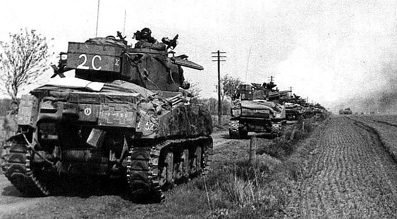 Sherman Firefly Mk.IC behind a Sherman Mk.V tank. Both are armed with 'Tulip' rockets.